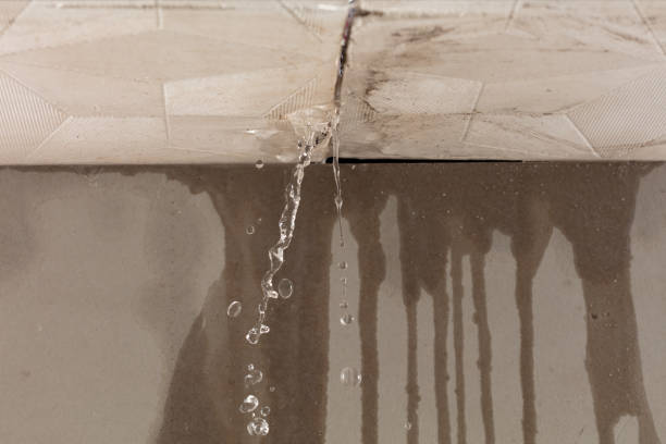 Professional Flood Damage Cleanup technician working in Far Rockaway, NY